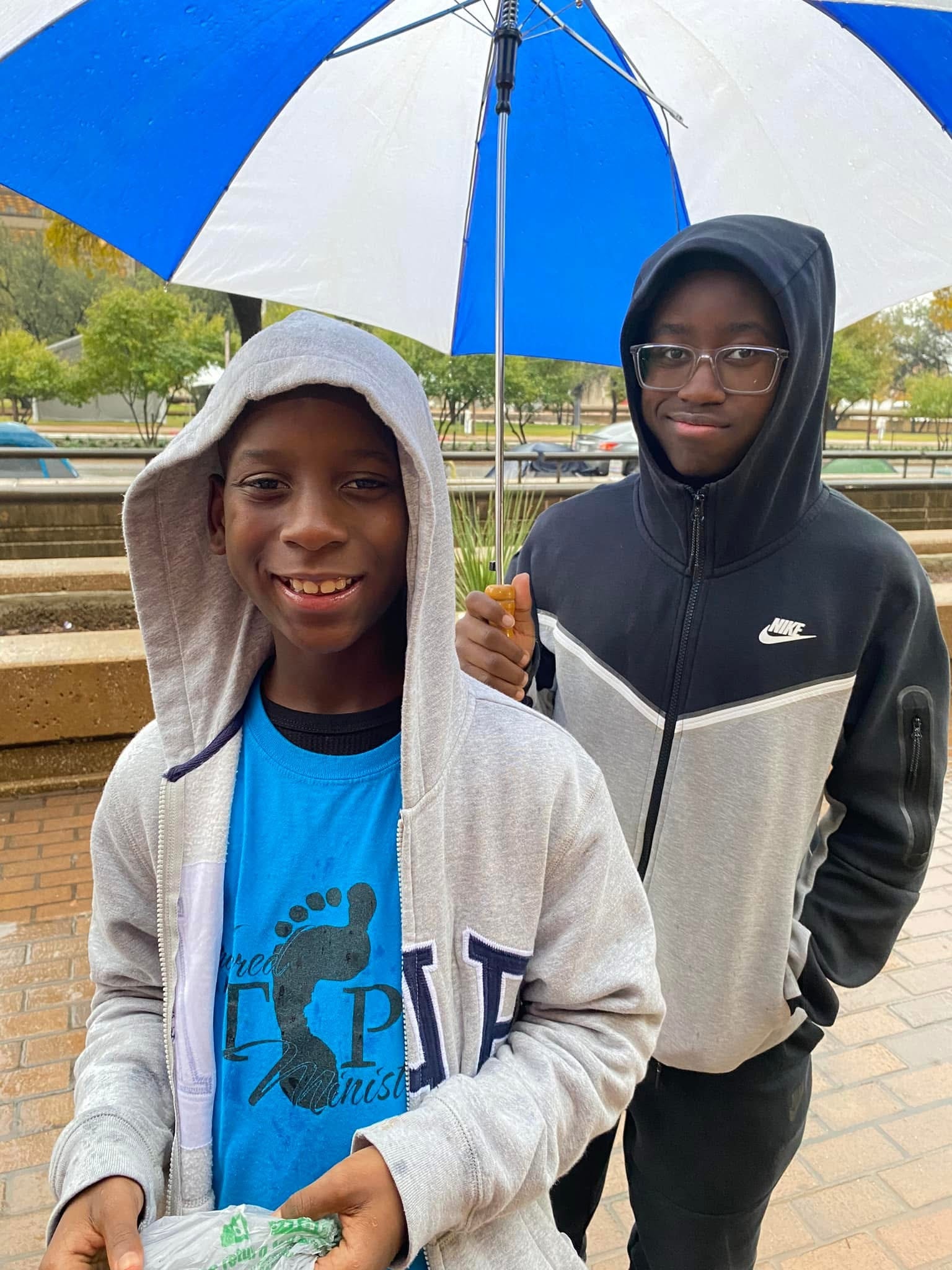 Prison outreach — holding the Ordered Steps banner