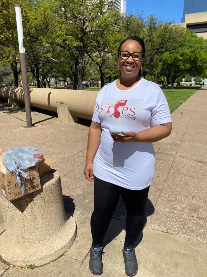 Ordered Steps volunteers in ministry shirts